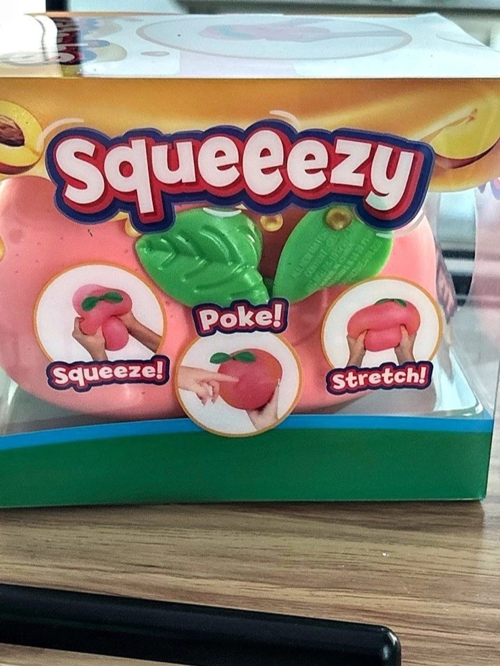 Sunny Days Entertainment Squeezy Peach Toy NWT
